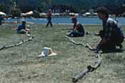 Attendees assembling the installation