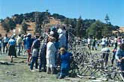 Attendees assembling the installation