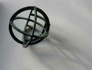 Small bronze orb sculpture